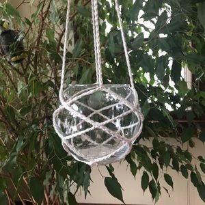 Crocheted hanging glass bowl